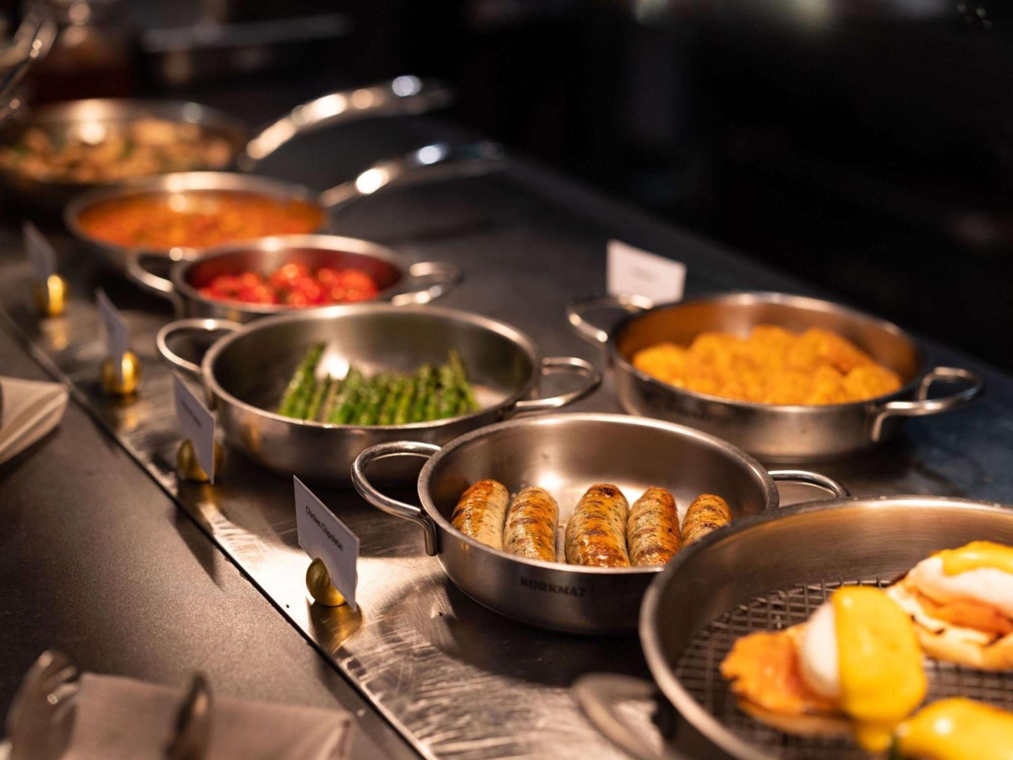The Playford Adelaide - Mgallery Exteriör bild A selection of prepared foods at a buffet