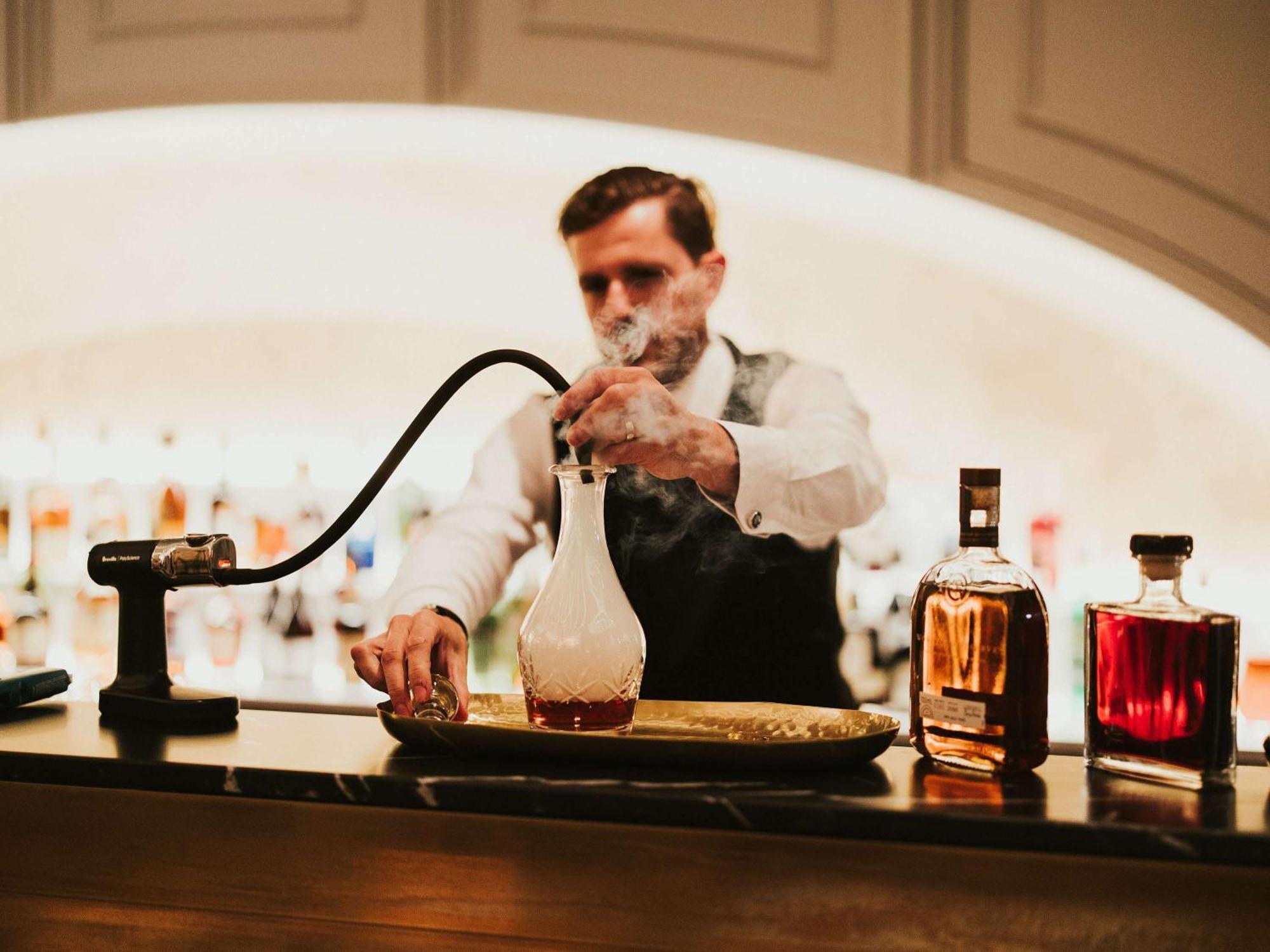 The Playford Adelaide - Mgallery Exteriör bild A bartender at work