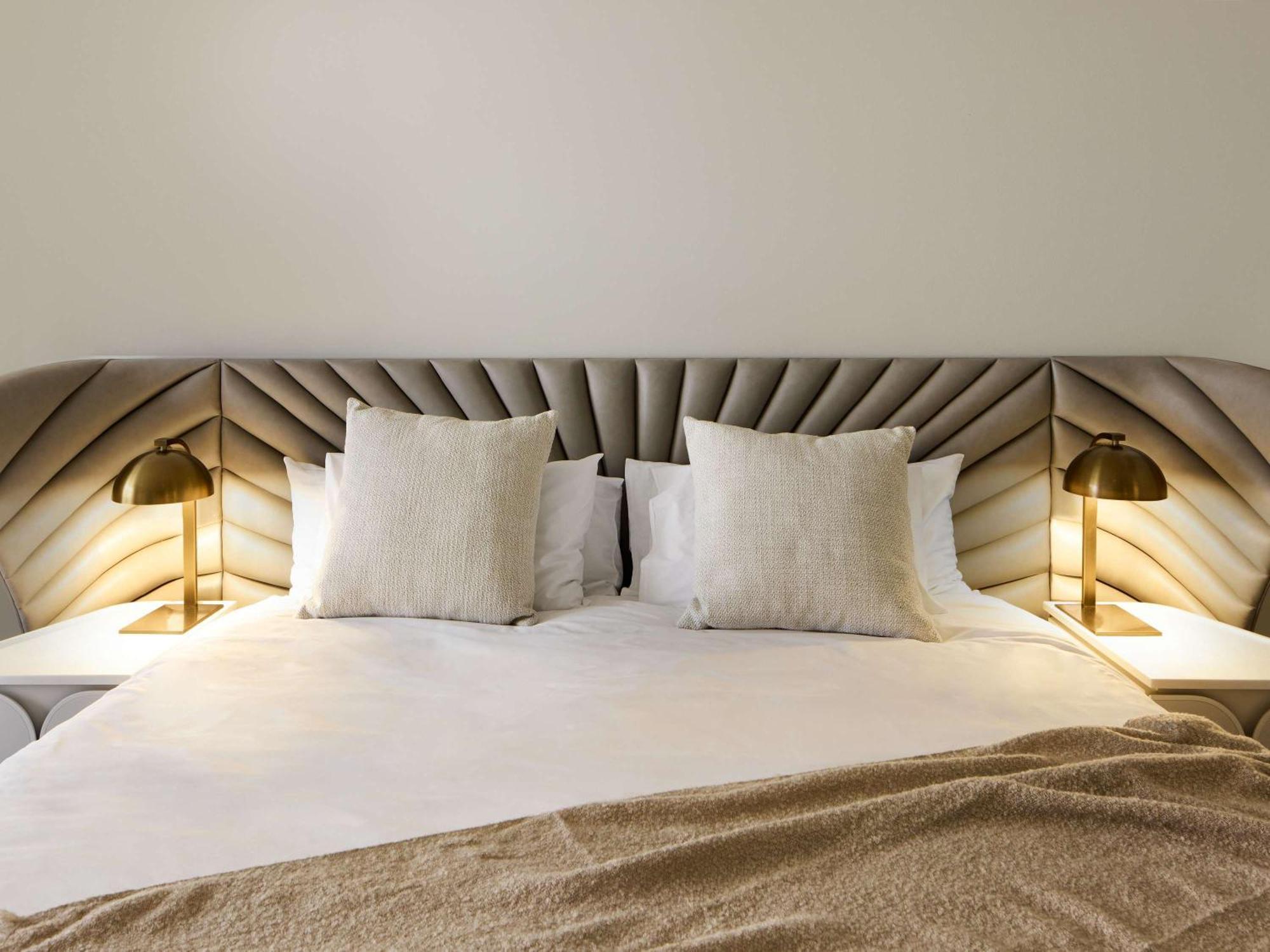 The Playford Adelaide - Mgallery Exteriör bild A bed with a headboard